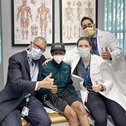 Pediatric orthopaedic patient Darren and his surgeons
