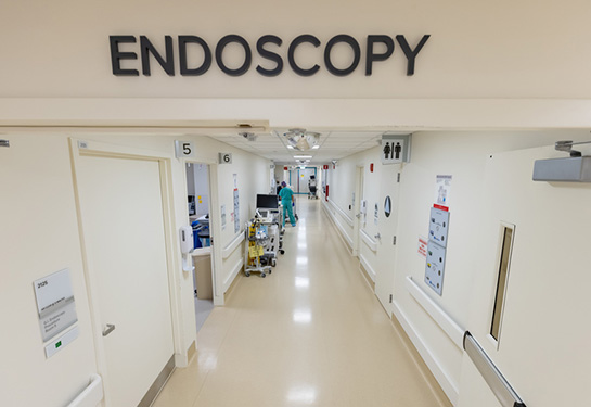 Hallway in hospital with Endoscopy written above doorway