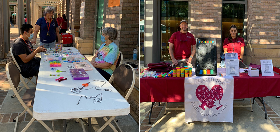 left photo: three adults, two wearing masks, are gathered outside around a table with beads arranged in boxes. Two are seated and one is standing. An orange sign behind them says “Bead Art.”, right photo: Two adults dressed in maroon T-shirts stand behind a long table that is filled with toys and prizes, flyers, a banner that says “Warmline family resources center” and a black game that says “prize drop.”