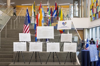 The event featured the Principles of Community written in several languages and flags to represent countries around the world