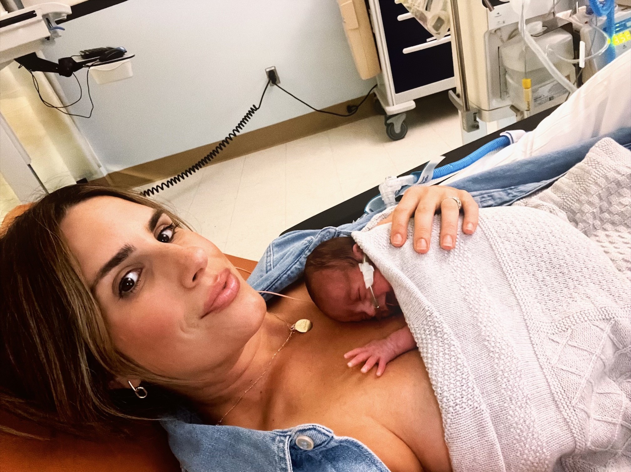 Lori with Jones on her chest in the NICU