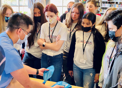 Dr. Nguyen with Antelope HS students