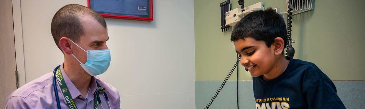 UC Davis pediatrician Eric Crossen provides care during an annual physical