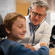 Pediatric orthopaedic patient mason and Duchenne muscular dystrophy expert Craig McDonald