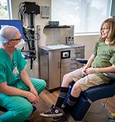UC Davis pediatric general surgeon Jonathan Kohler, M.D., M.A., provides care for a patient in the pediatric surgery clinic.