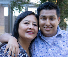 A woman and young man smiling (c) UC Regents. All rights reserved.