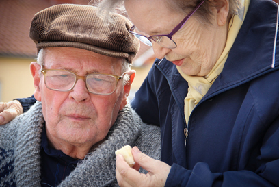 Elderly couple sharing a snack. (c) Pixabay. All rights reserved.