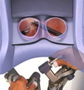 surgeon using daVinci robot surgeon using daVinci robot