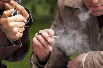 Image of cannabis smokers &#169; iStockphoto