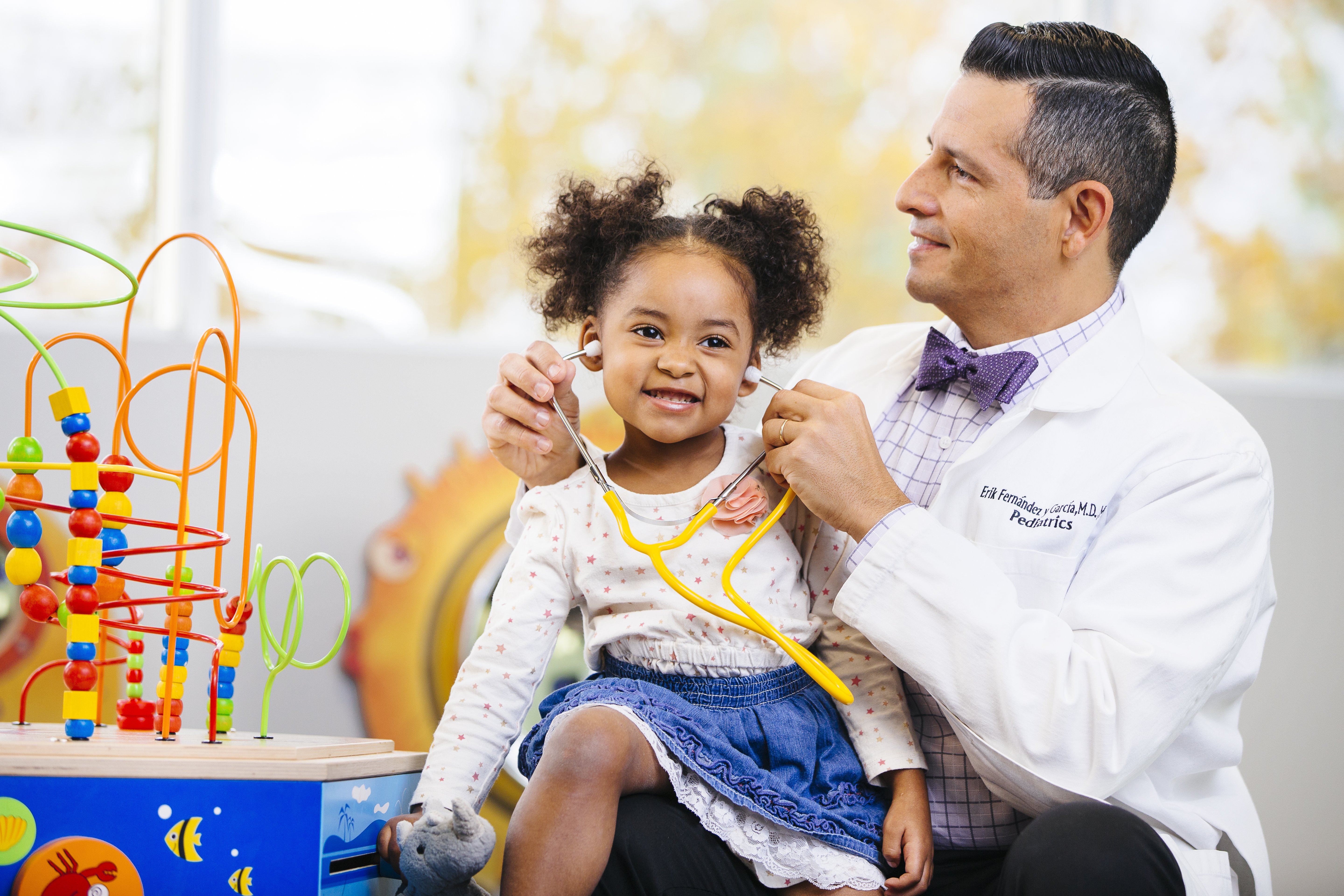 UC Davis Health doctor with little girl