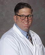 Ryan Martin, M.D., a neurocritical care physician and assistant professor in the Department of Neurological Surgery
