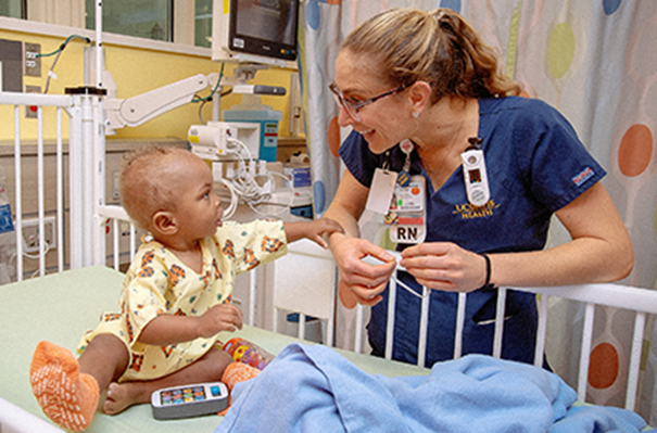 Children's Surgery Center nurse and pediatric patient 