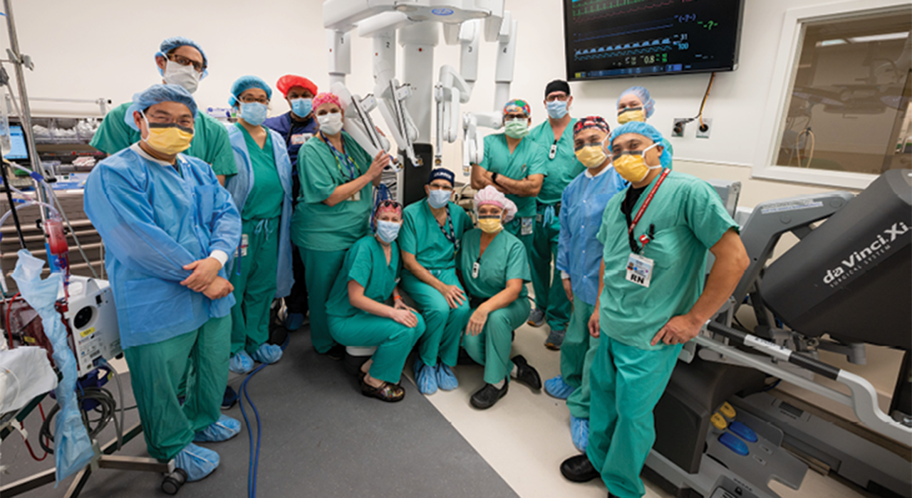 UC Davis Health cardiac surgery chief Bob Kiaii and team members in a robotic surgery suite