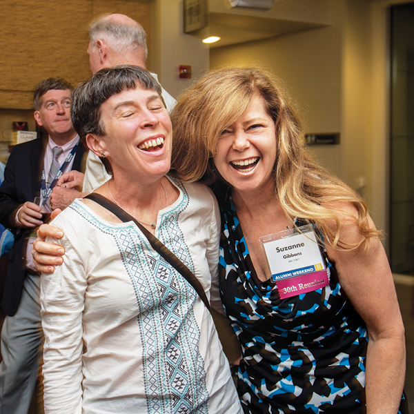 Suzanne Gibbons (M.D., ’87) of Sacramento shares a laugh with classmate Jerri Britsch (M.D., ’87) of Oregon.