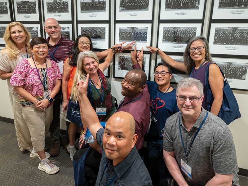 Members of the Class of 1994 look back on their class photo, reflecting on the memories and accomplishments from their time together.