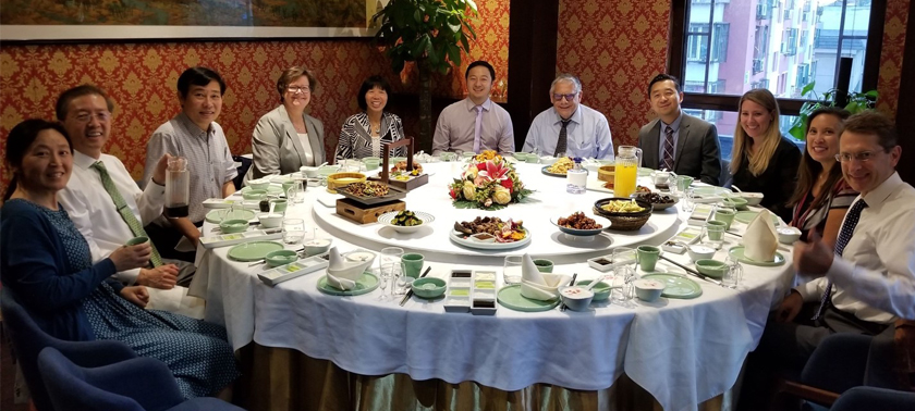 UC Davis Health faculty dine in Bejing, China. (c) UC Davis Regents.