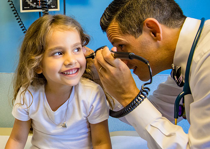UC Davis pediatrician check-up with young patient
