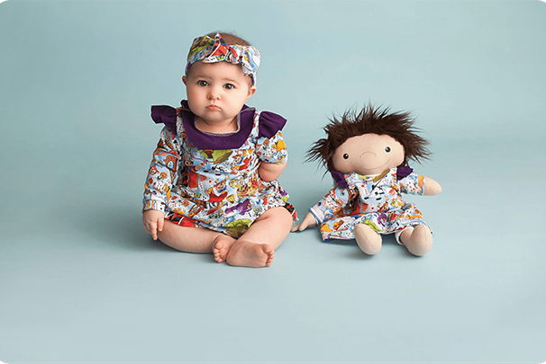 Picture of baby and doll from company A Doll Like Me