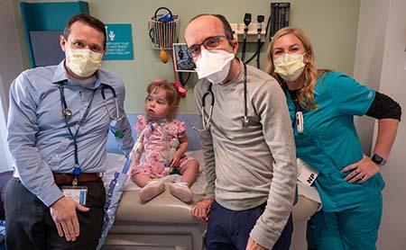 Patient Everly Jacobsen with members of the pediatric hypertension team: Brian Goudy, Rory Kamerman-Krezmer and nurse practitioner Callie Brecek.