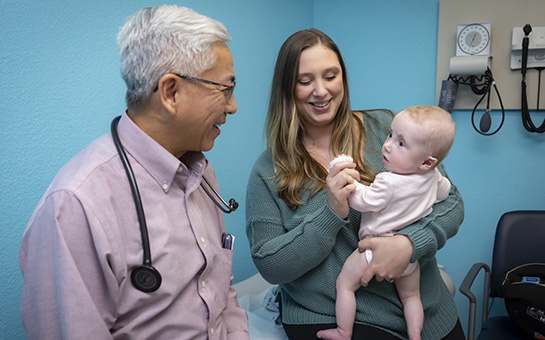 Amanda Hodgkin with daughter Lillian and Frank Ing, M.D., chief of pediatric cardiology