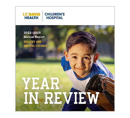 2022-2023 Report Cover: Neonatology patient Alfredo on the baseball field
