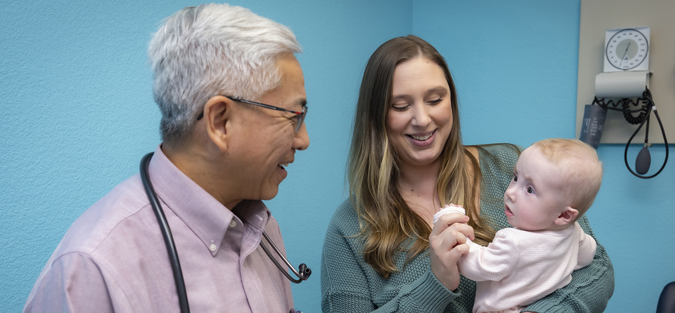 Amanda Hodgkin with daughter Lillian and Frank Ing, M.D., chief of pediatric cardiology