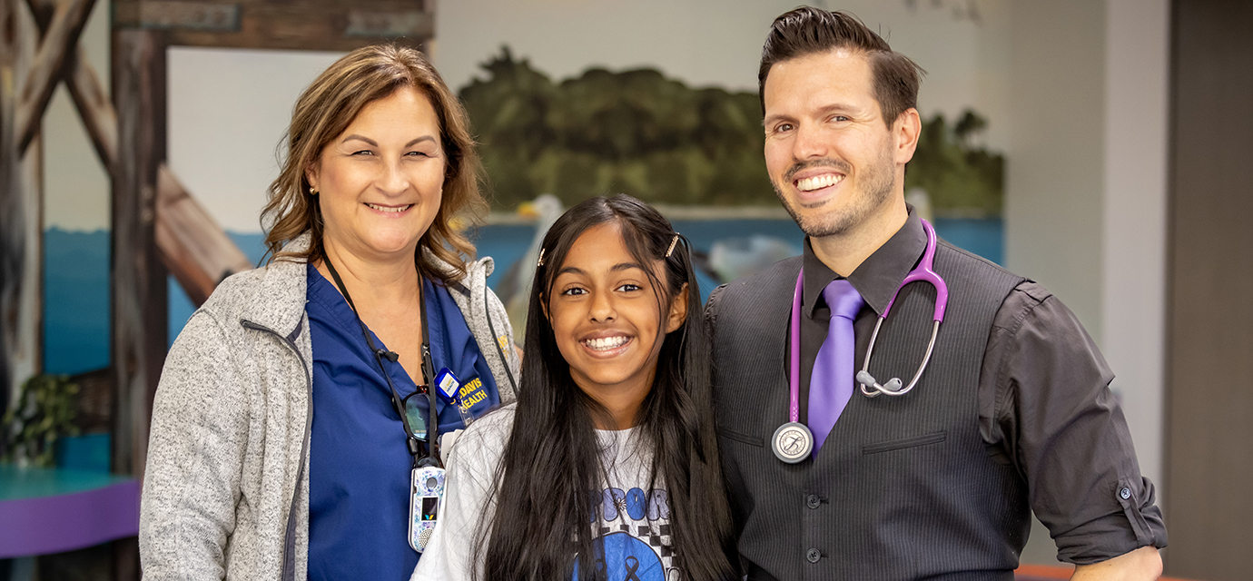 Melina with care team members Shelli Beck, RN, BSN, CDCES, and Alex Nella, PA-C, RD, CDCES