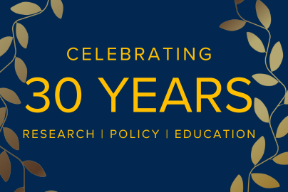 Gold leaves border the text "Celebrating 30 Years" and "Research | Education | Policy".