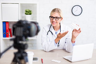 Doctor on camera (C) Adobe stock. All rights reserved.