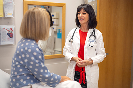 Dr. Amparo Villablanca with a patient.