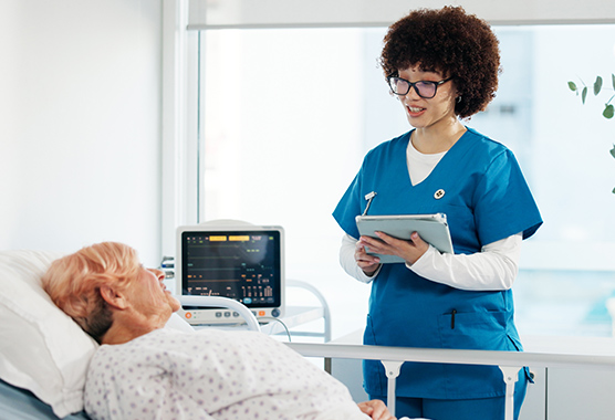 Female patient looking at a health care provider preparing for gallbladder Surgery. 