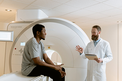 A doctor discussing an MRI scan with a patient