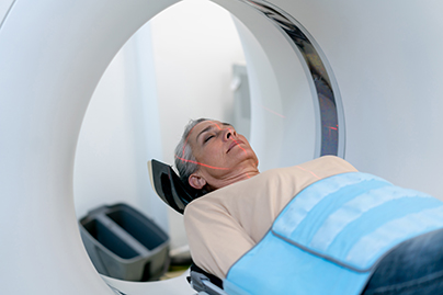 Female patient in a MRI machine 