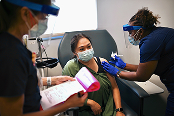 Marites Ramos receives the COVID-19 clinical trial vaccine at UC Davis Health 