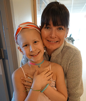Lydia Alwan and her mom, Jessica, during a round of chemotherapy treatment at UC Davis Children's Hospital.