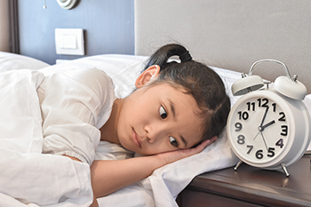 Move your child’s bedtime 10 minutes later each day, starting one week before the time change.