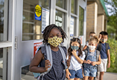 Studies show kids will wear masks and keep social distancing in school if asked.