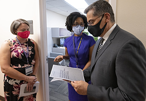 HHS Secretary Xavier Becerra with Drs. Tara Niendam and Ruth Shim, visiting the Early Psychosis Programs clinic