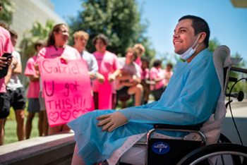 Gabriel Gonzalez smiles at former teammates and friends.  The 18-year-old is being treated for third-degree burns over 46% of his body.