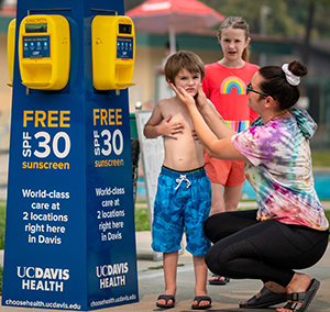 Free sunscreen stations like this one at Manor Pool in Davis are provided by UC Davis Health.