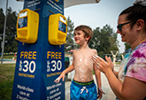 Free sunscreen stations like this one at Manor Pool in Davis are provided by UC Davis Health to encourage the public to enjoy the outdoors safely.