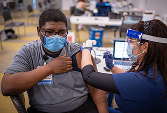 In late 2020 and early 2021, UC Davis Health operated an employee vaccination clinic that administered up to 900 shots daily. 