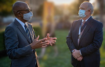 President Drake talks with newly appointed Kelly Presidential Chair in Vitreoretinal Science Paul Sieving.