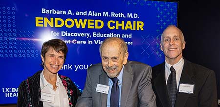 Former UC Davis faculty member Alan M. Roth, center, pictured at the ceremony with his daughter Deborah Roth and son Steven Roth