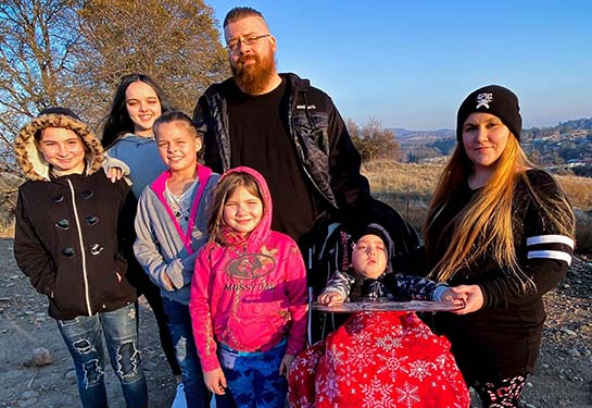UC Davis Health patient Killian Christie and his family spend time outdoors.
