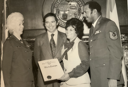 Martha Pennington, center left, receives recognition for her life's work