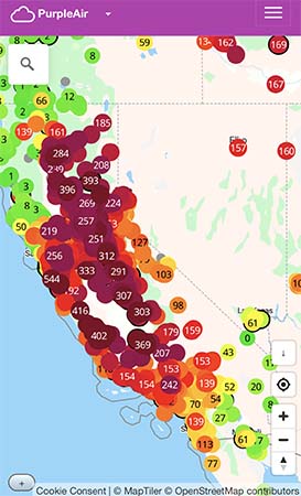 A map of California showing red and purple dots depicting poor air quality in the Bay Area and Central Valley.