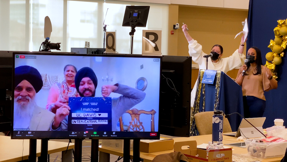 Medical student Harjot Singh Virk pumps his fist into the air in approval of being matched for the interventional radiology program at UC Davis Health