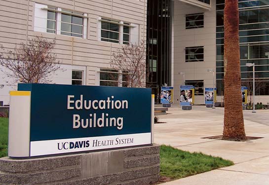 UC Davis Health Education Building with sign in front