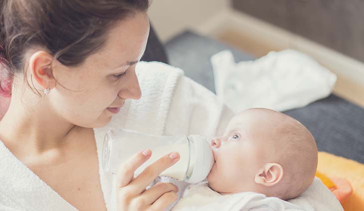 Mom feeding baby